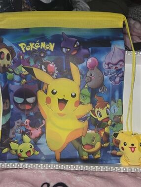 NEW.. Pokémon Pikachu Drawstring Backpack - Yellow Accent With Bag Charm